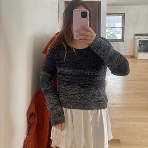 Francesca’s dark blue sweater